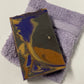 black amber and lavender scented handmade bar soap with black, purple and gold swirls